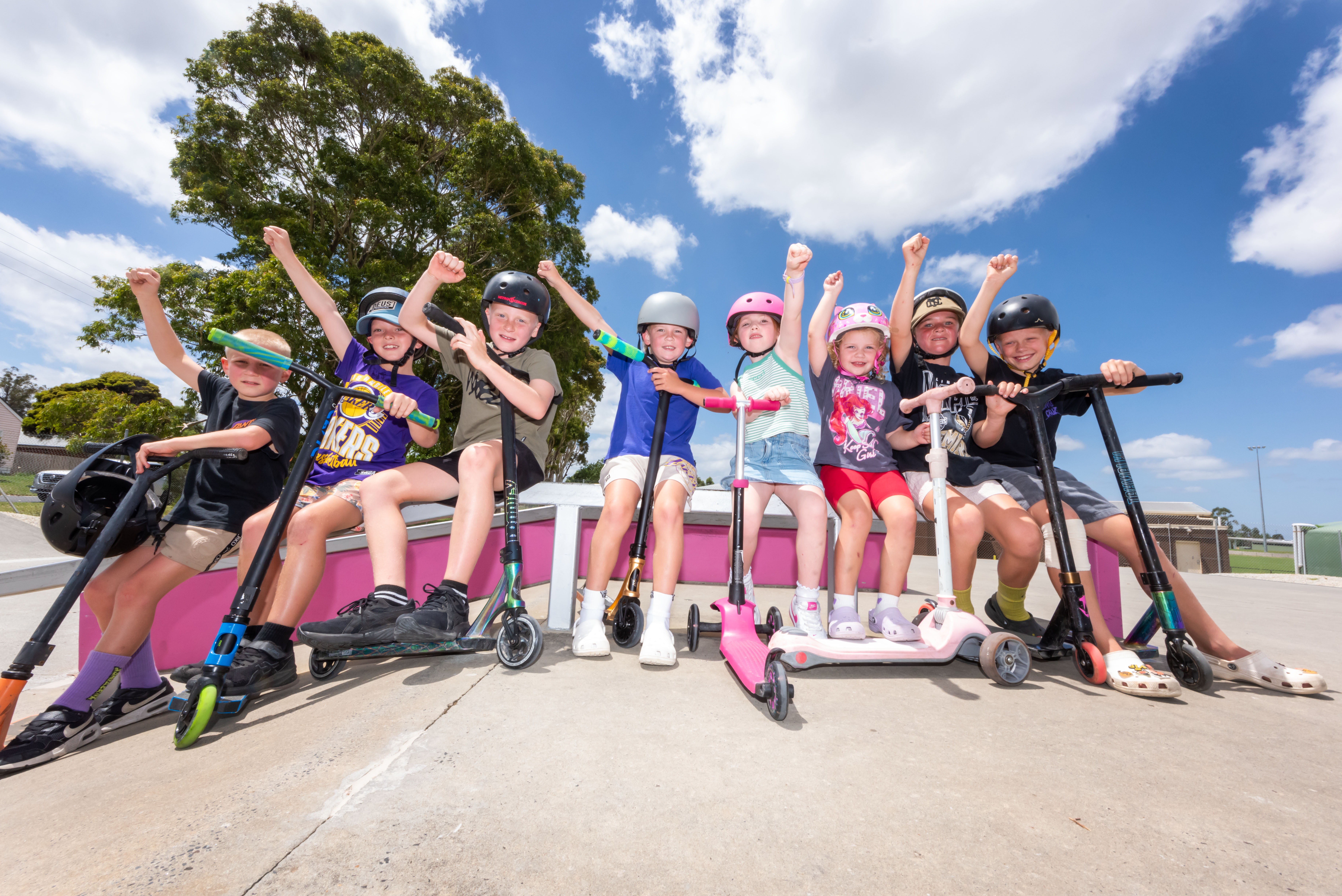 Local scooter fans hanging out at the newly refurbished Garfield Skate Park.