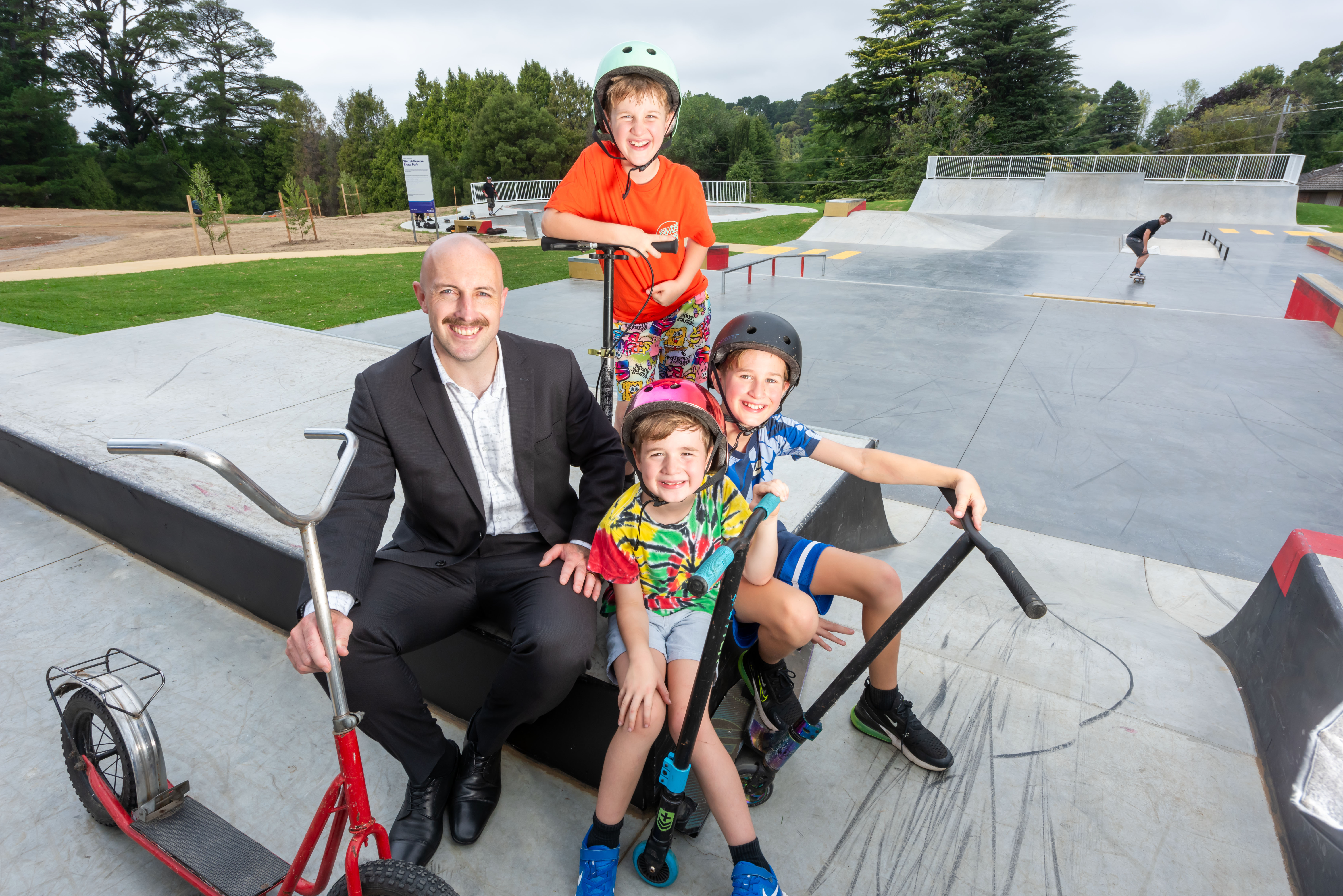 Mayor Kowarzik with local scooter fans enjoying the brand new Worrell Reserve Skate Park and Youth Plaza.